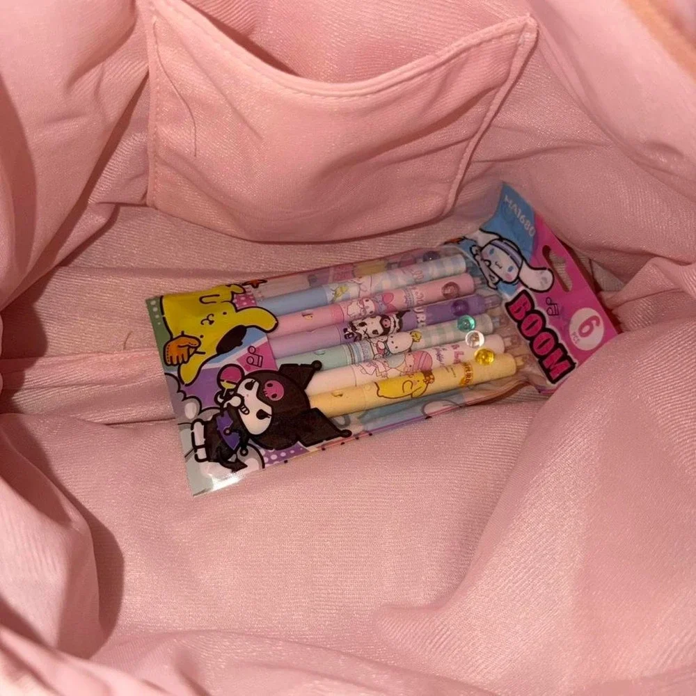 My Melody pink backpack with bow and ribbon details and pack of pens